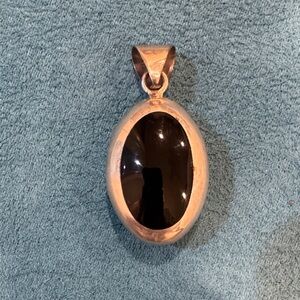 Sterling silver, onyx and malachite reversible pendant